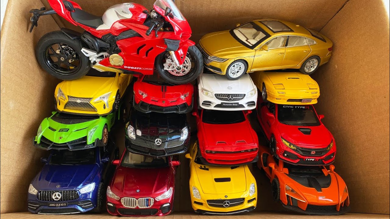 Box full of diecast Cars, Top toy Cars, Race Motorcycle, Toyota LC500, Lamborghini, SLR