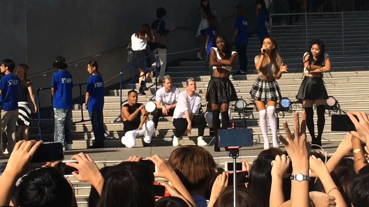 Ariana Grande performing Break Your Heart Right Back