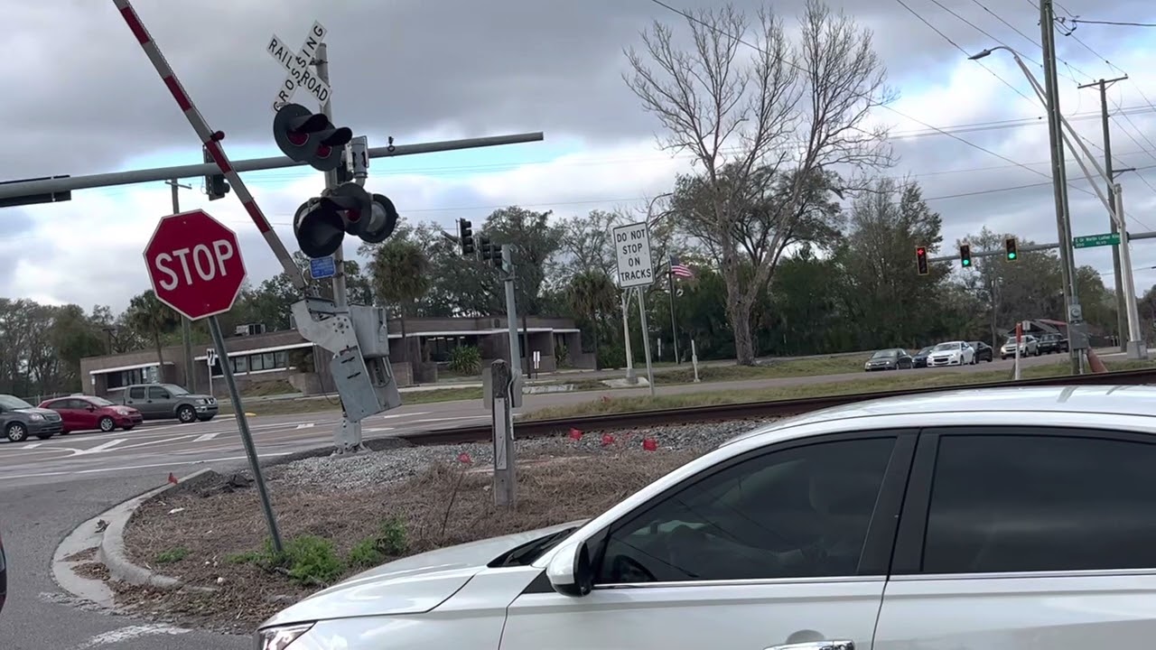 Amtrak 91 goes by a broken crossing gate (Most viewed video)