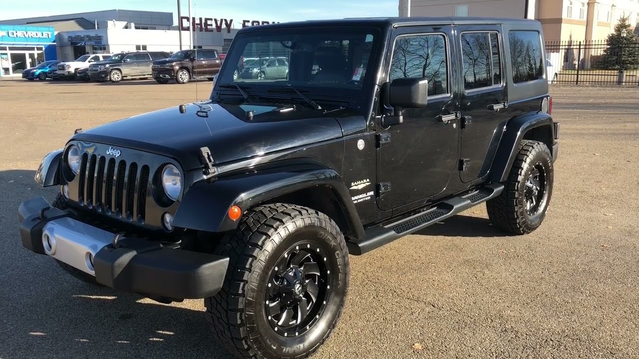 Обзор Jeep Wrangler Unlimited Sahara 2015 года