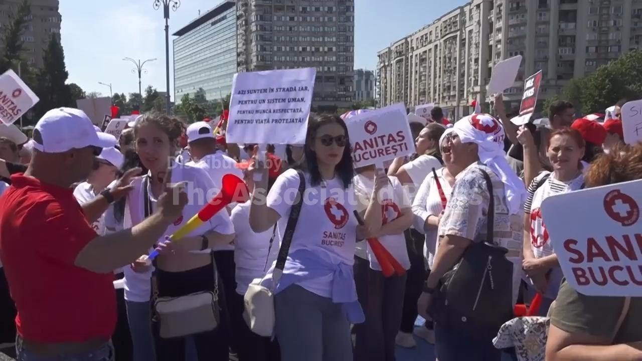 Thousands of Romania health care workers protest new laws on wages