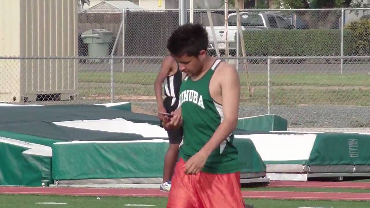 Selma Track Club vs Dinuba 15APR10 long jump rene