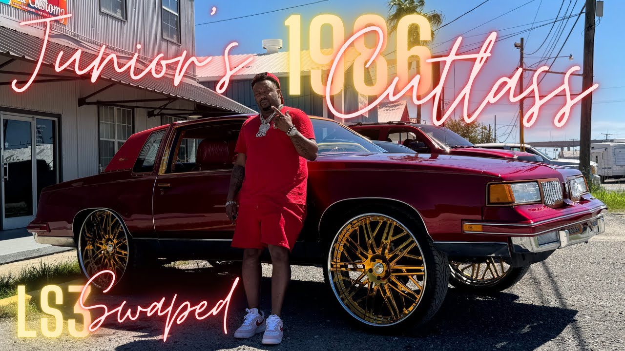 A Candy Red 1986 Cutlass Supreme With A Euro Clip, And 26 Inch Gold Forgiato's (G-Ride With junior)