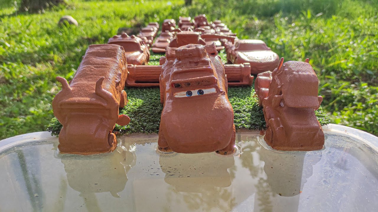 Disney Pixar Cars Various Cars miniature cars roll down a colorful slope and fall into the water!