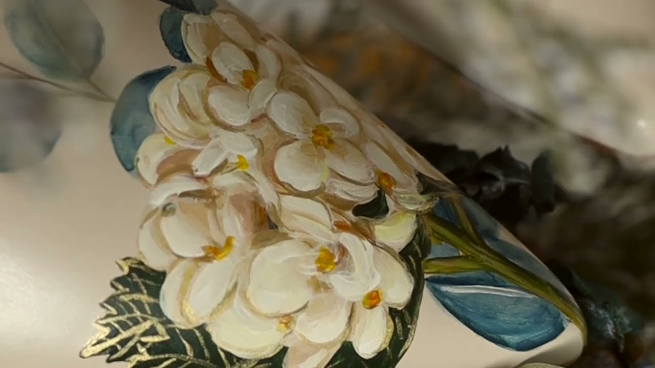 A closer look at hand-painted details from our Bridal Collection