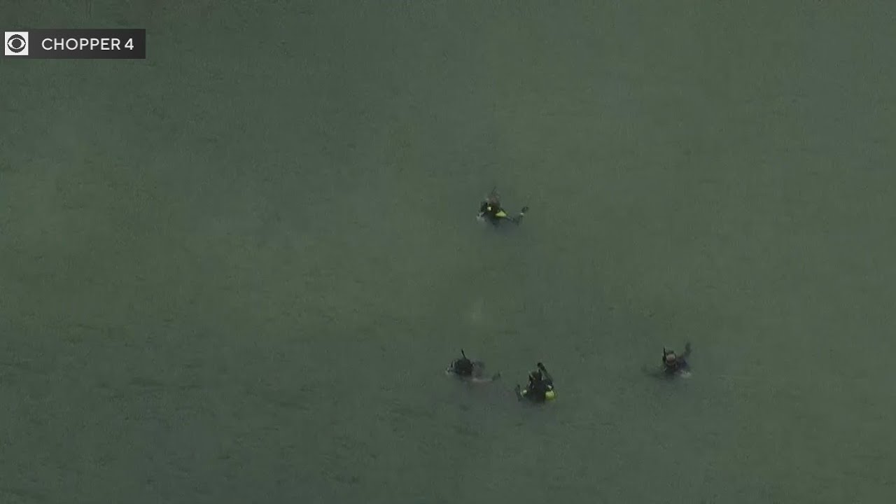 Crews search for driver after truck enters lake in Northwest Miami-Dade