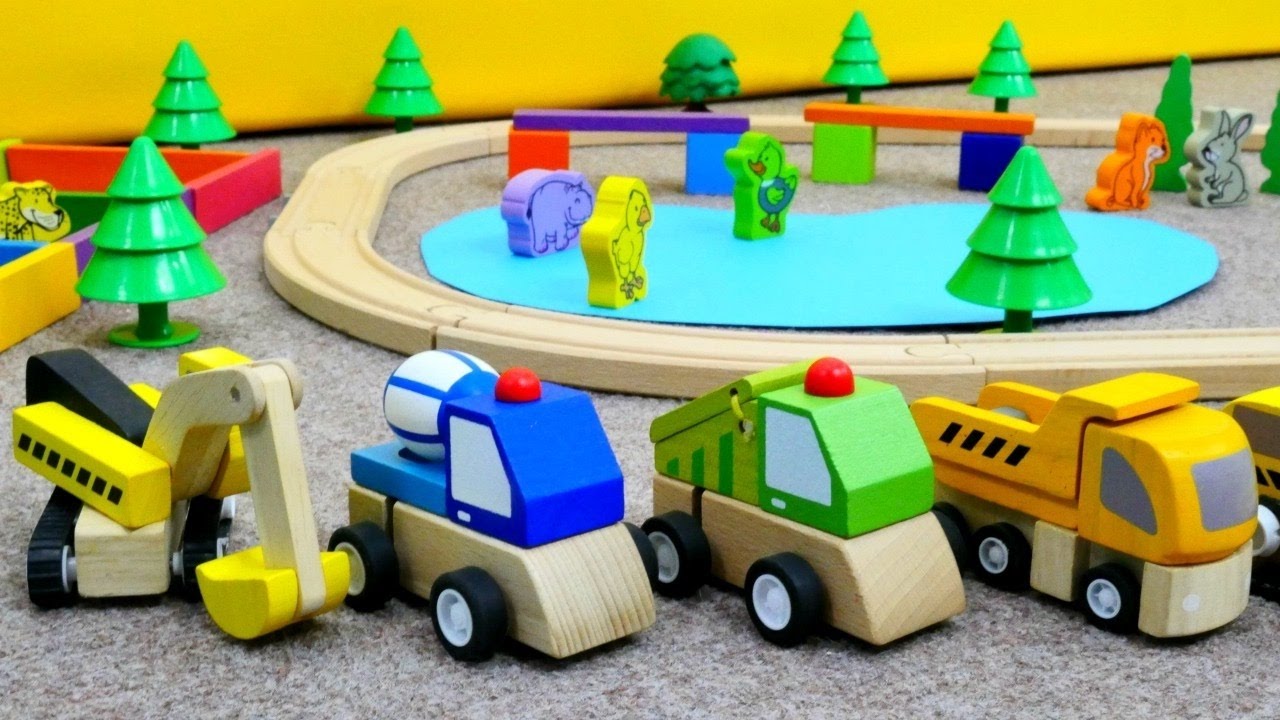 Spielzeugautos bauen einen Tierpark. Trickfilm für Kleinkinder.