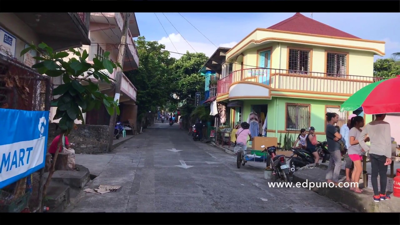 Walking along Abad Street - Batanes Center for Trade