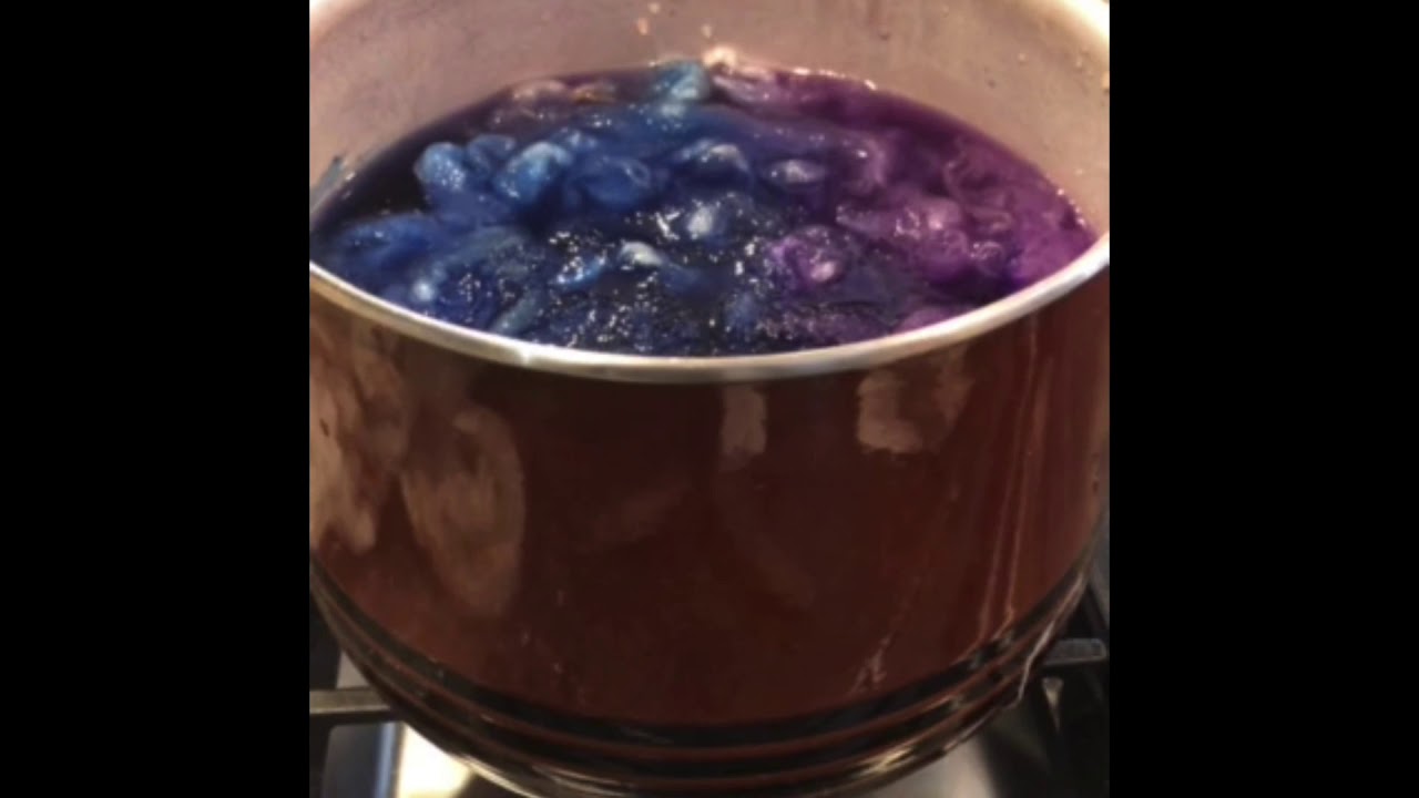 Dying wool in locks purple and blue
