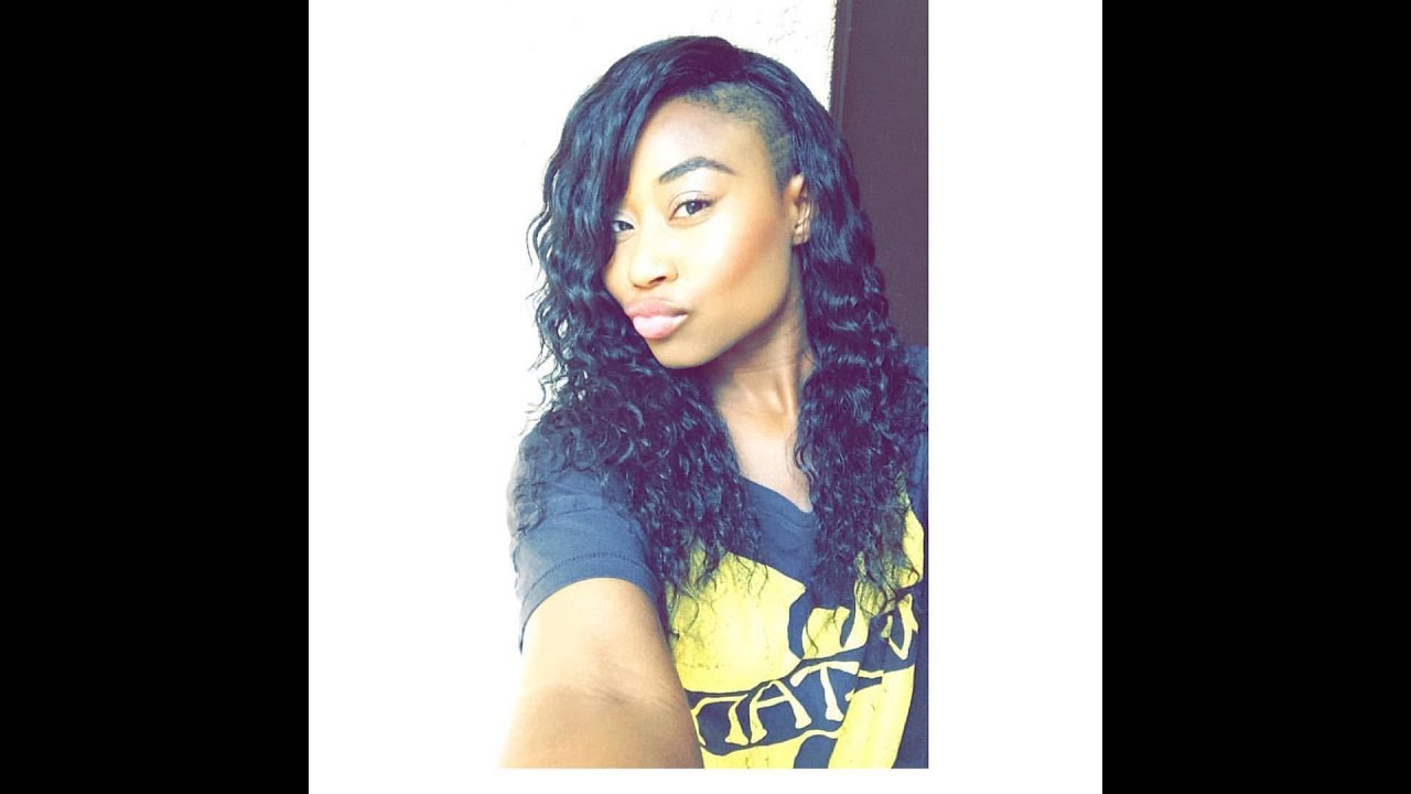shaved side and a sew-in weave at Hair Escapades