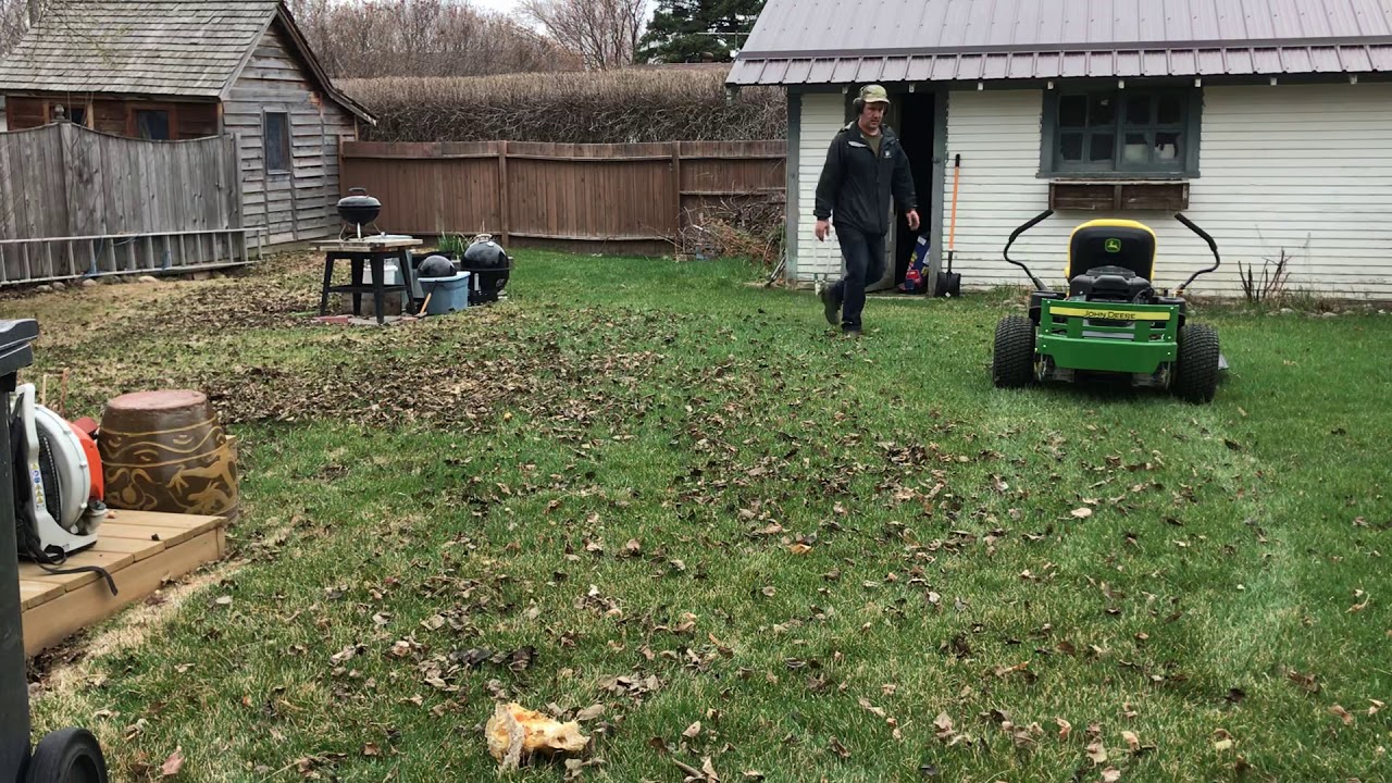 John Deere 335e with mulching kit