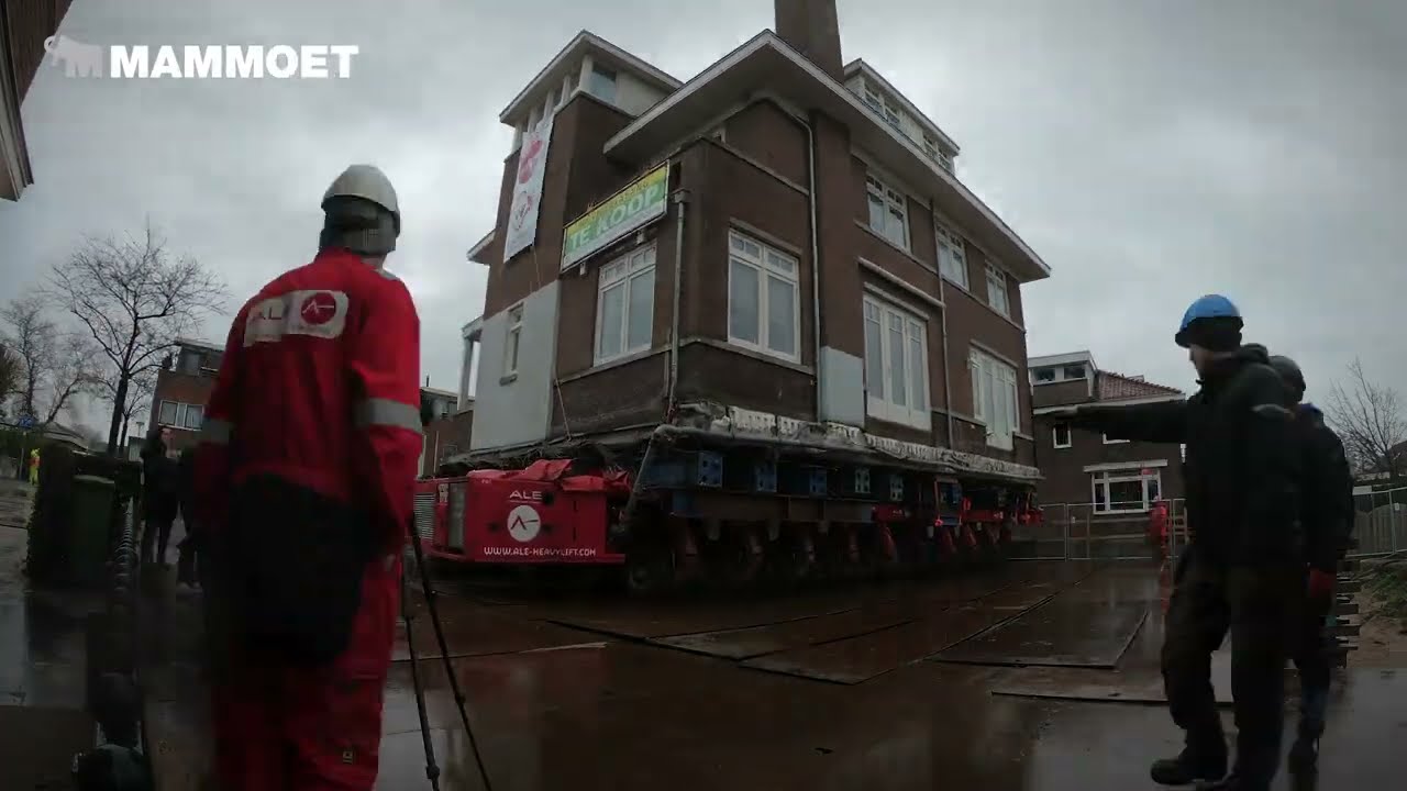 30 axle lines of SPMTs used to relocate an entire house