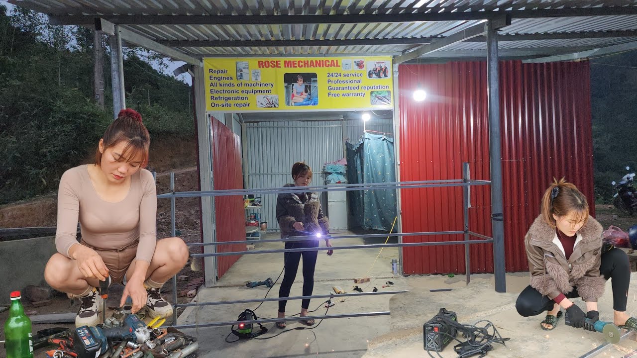 The repair girl: welding a metal shelf for her tools all by herself