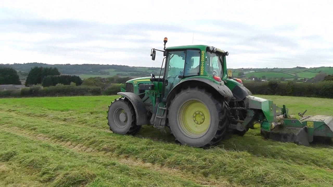 Mowing the Second Cut.  With John Deere 6520.
