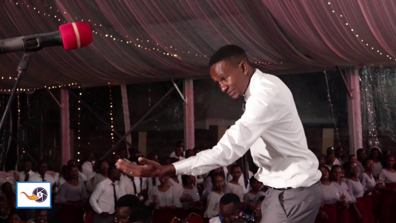 COULD THIS BE THE MOST INTERESTING CHOIR CONDUCTOR IN AFRICA?