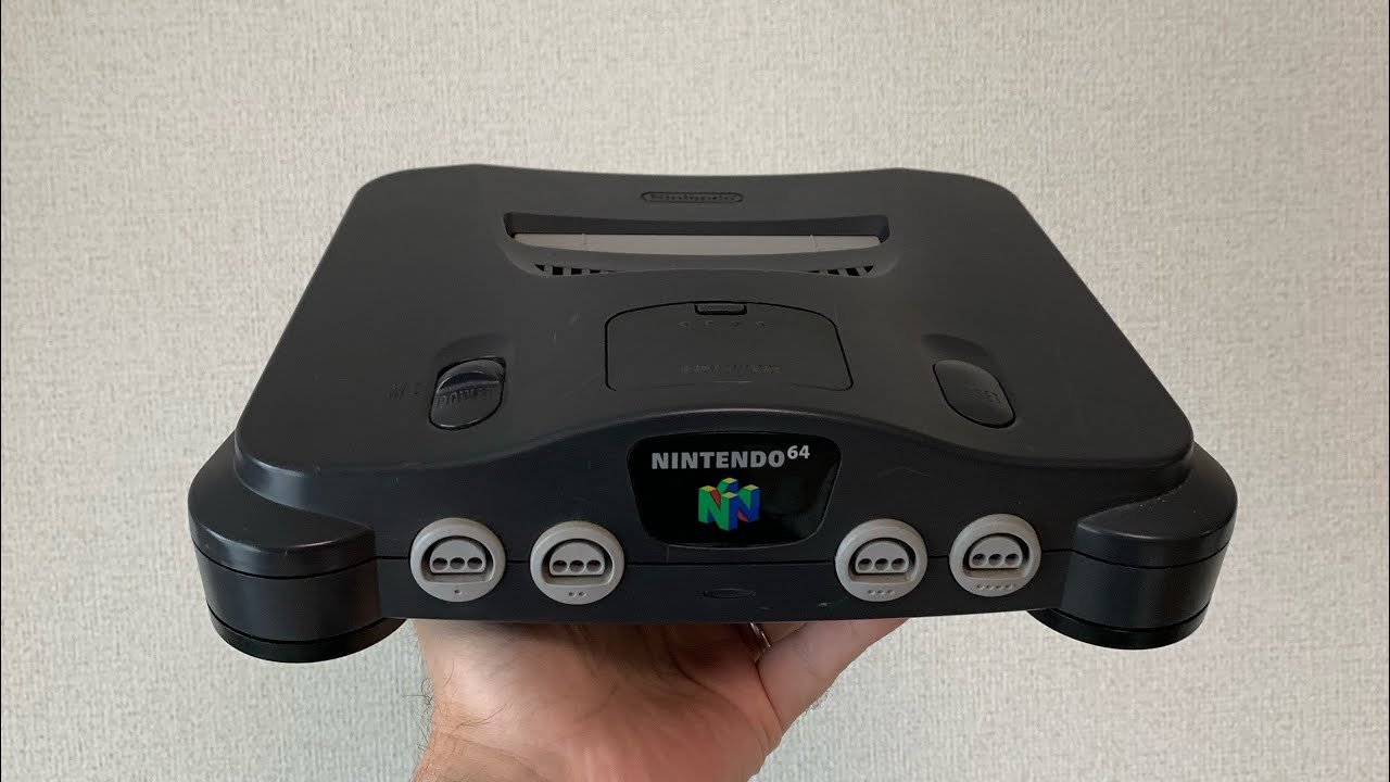 Nintendo 64 N64 Console with a broken hair clip jammed in the cartridge slot Clean and Fix Teardown