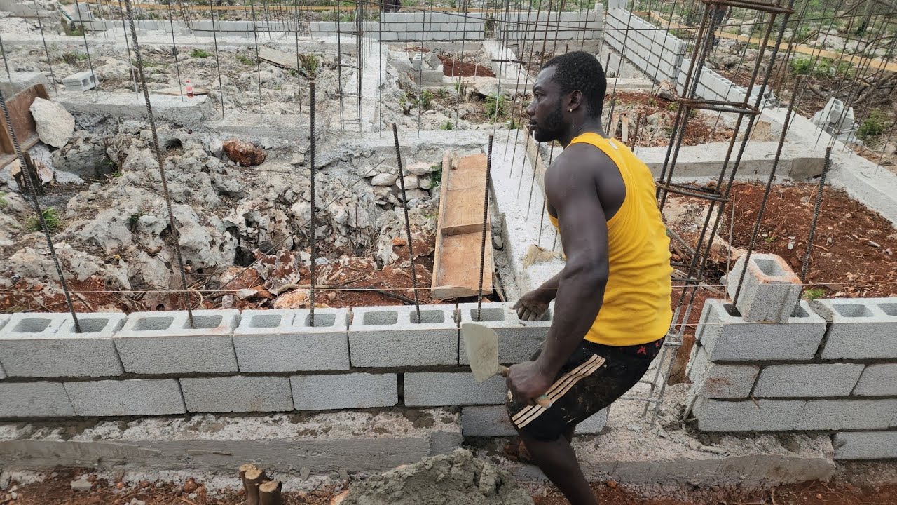 Laying 6-inch Concrete Blocks For Wall Construction In Jamaica