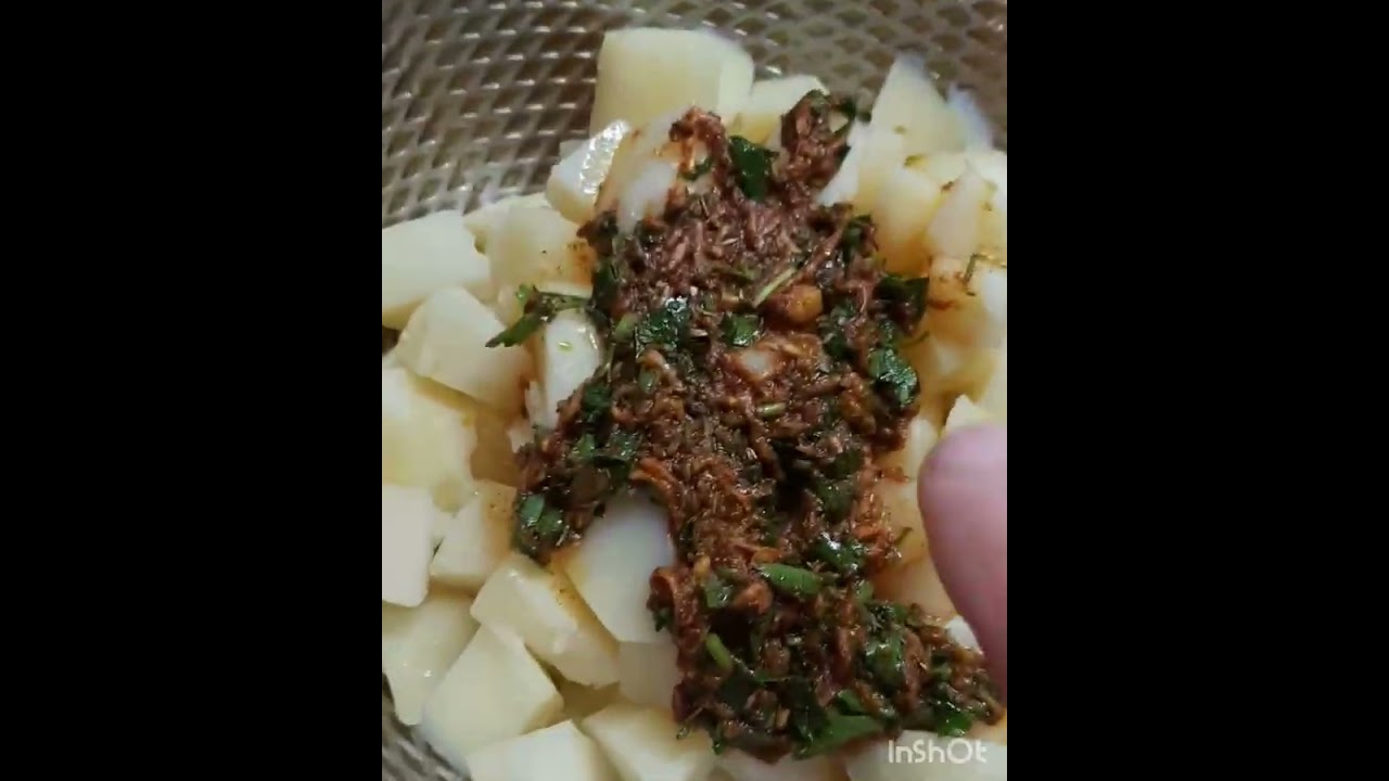 Pomme de terre courgette et haricot  cuit à a la vapeur puis mariner ensuite dorer au four 