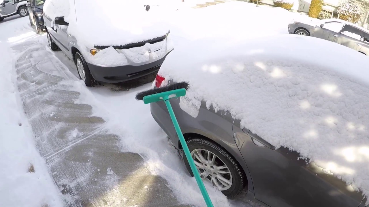 Swiping snow off my vehicle