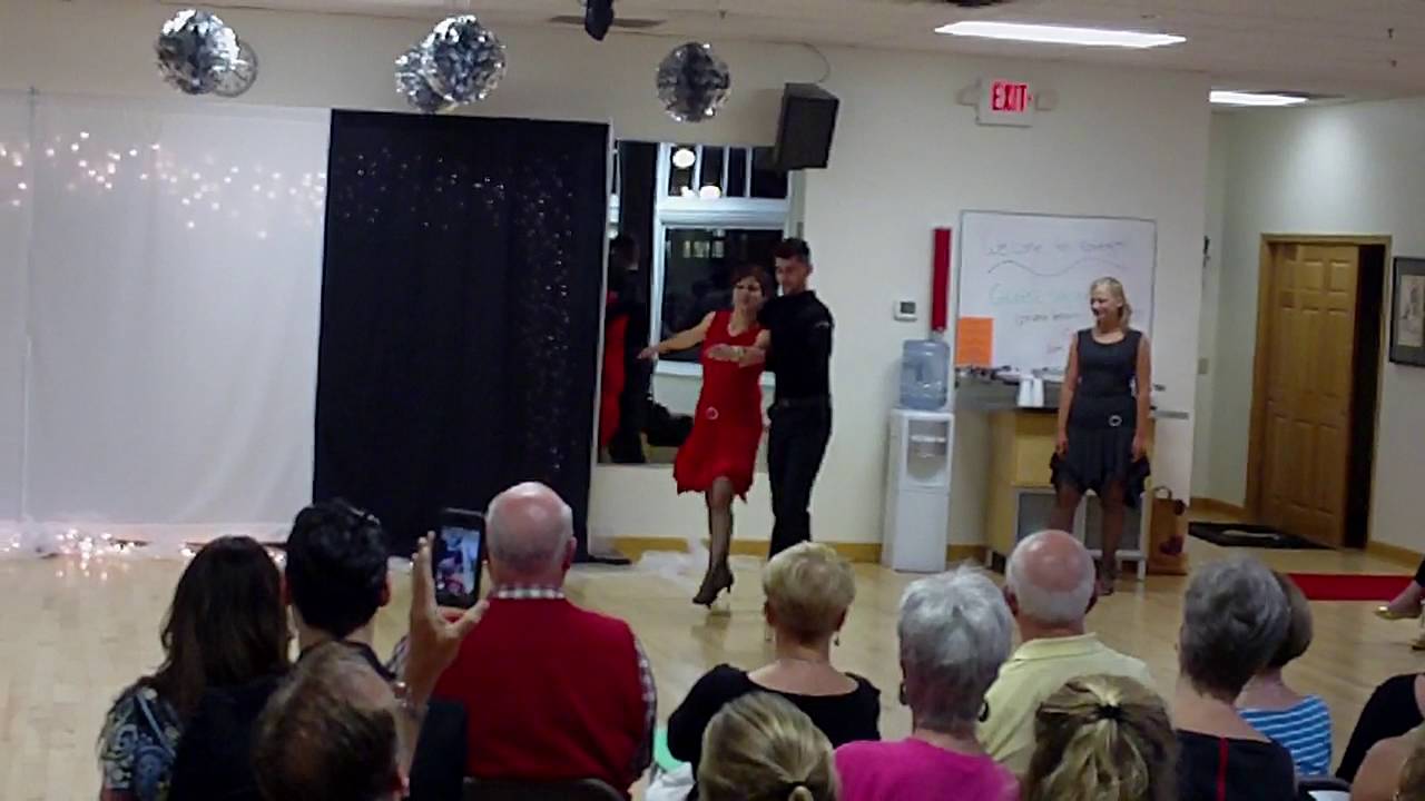 Mrs. Noble, Mr. Denis and Ms. Holly dancing the Samba