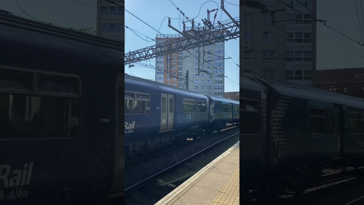 Class 318 departs Dalmuir