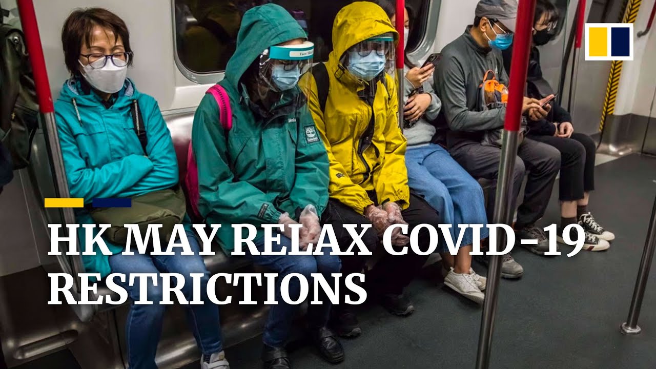 Hong Kong leader hints of possible easing of Covid-19 restrictions as city records 21,650 new cases