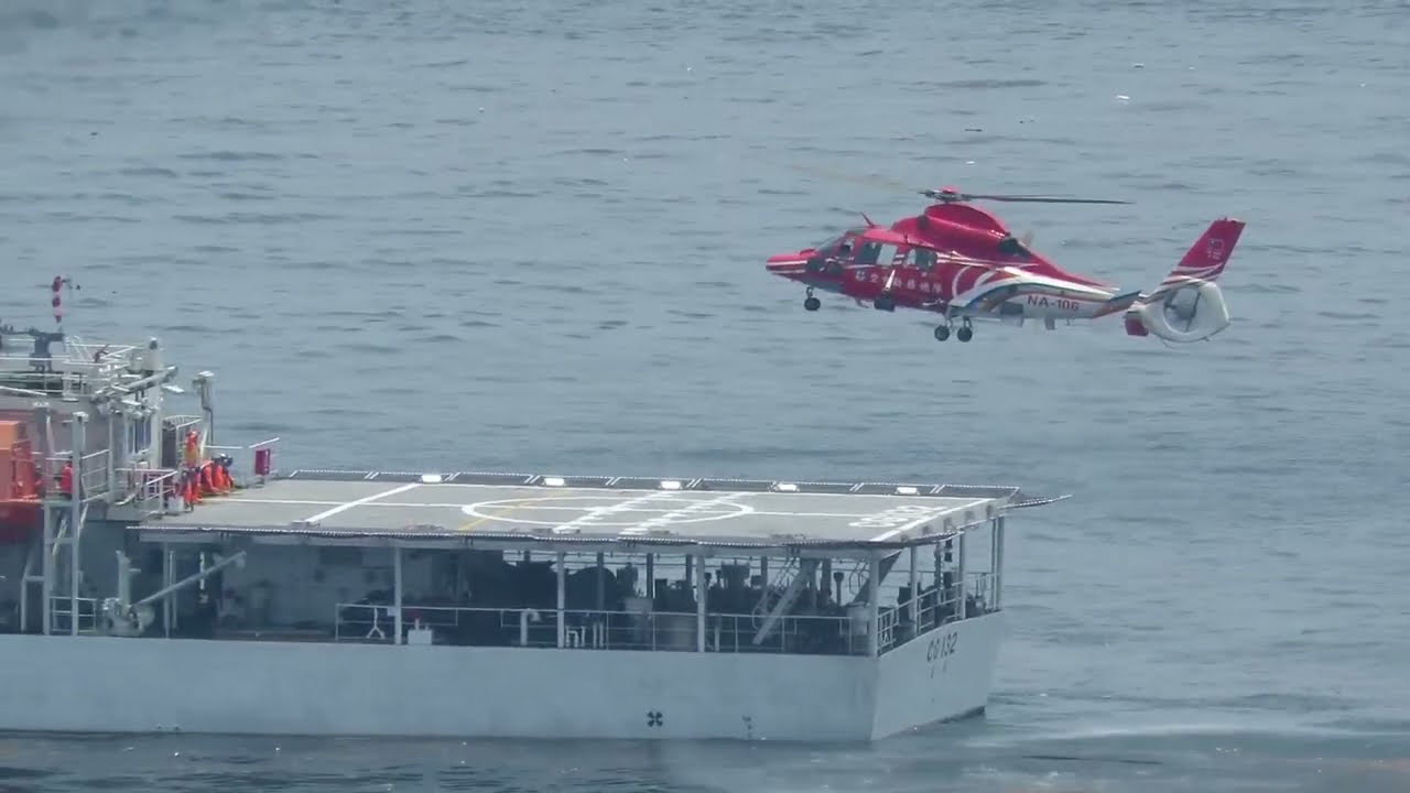 106-06-10 空中勤務總隊AS365N3海豚直升機NA-106降落和起飛自CG132桃園艦(海安九號演習)