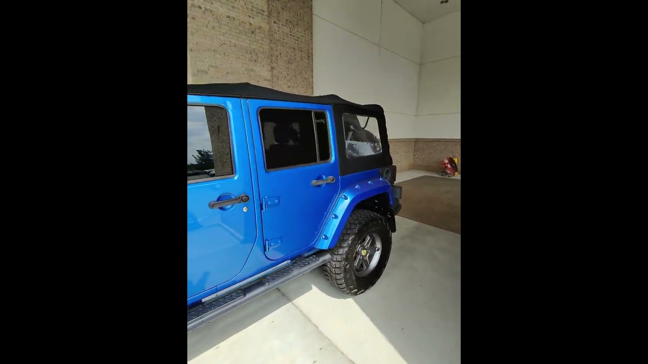 2015 Jeep Wrangler Unlimited Sport SUV $24,595 