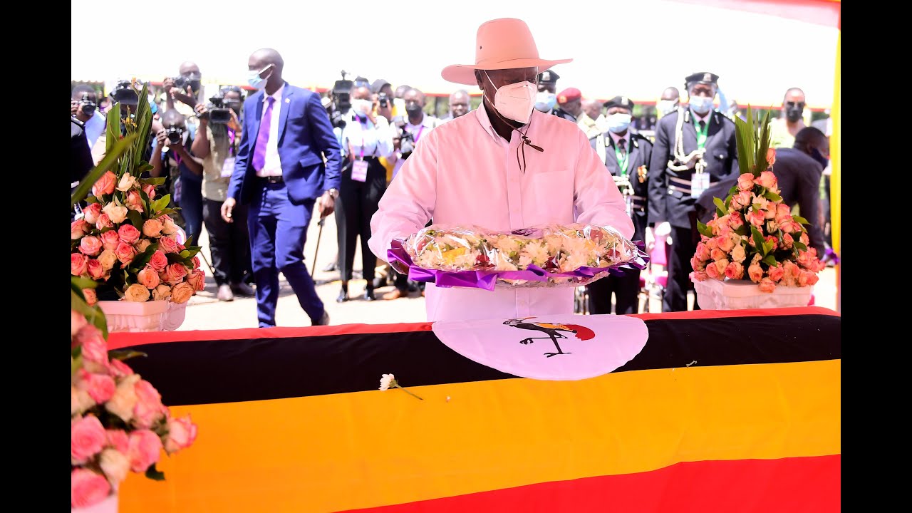 Museveni on Oulanyah's casket at Kololo, honors the fallen Speaker escorted by Mama Janet Museveni