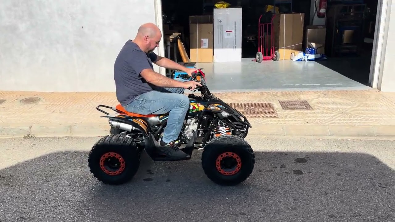 Quad moto cuatro ruedas gasolina de 125cc