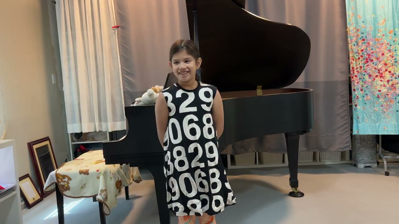 Isla plays Piano Adventures
