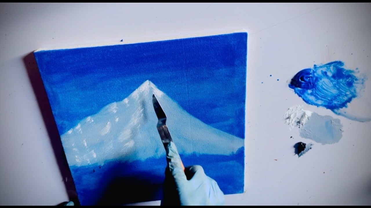 Silent Moonrise: The Wolf and the Frozen Peak