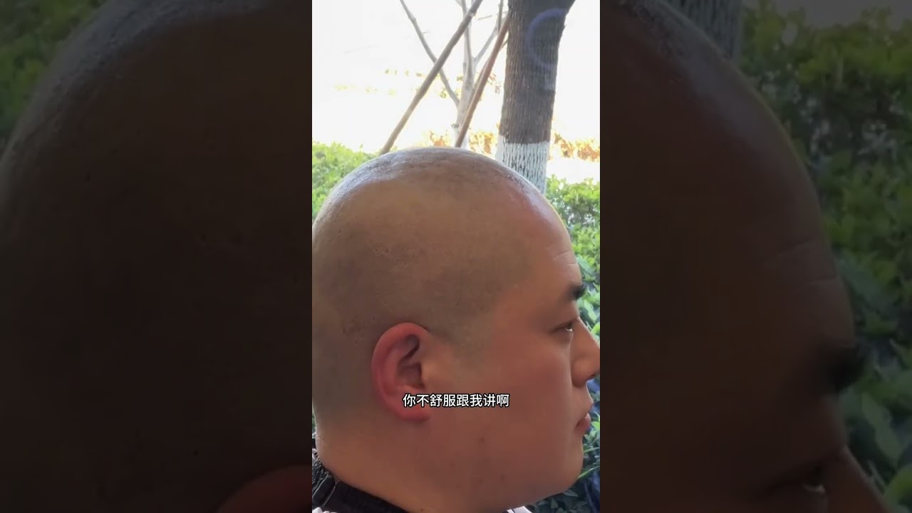 Beauty barber gives this man a head shave