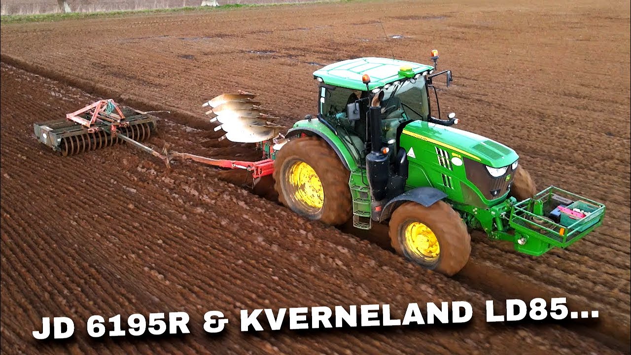 4Kᵁᴴᴰ John Deere 6195R ploughing on Stone Common with a Kverneland LD85 Plough & NRH coil packer