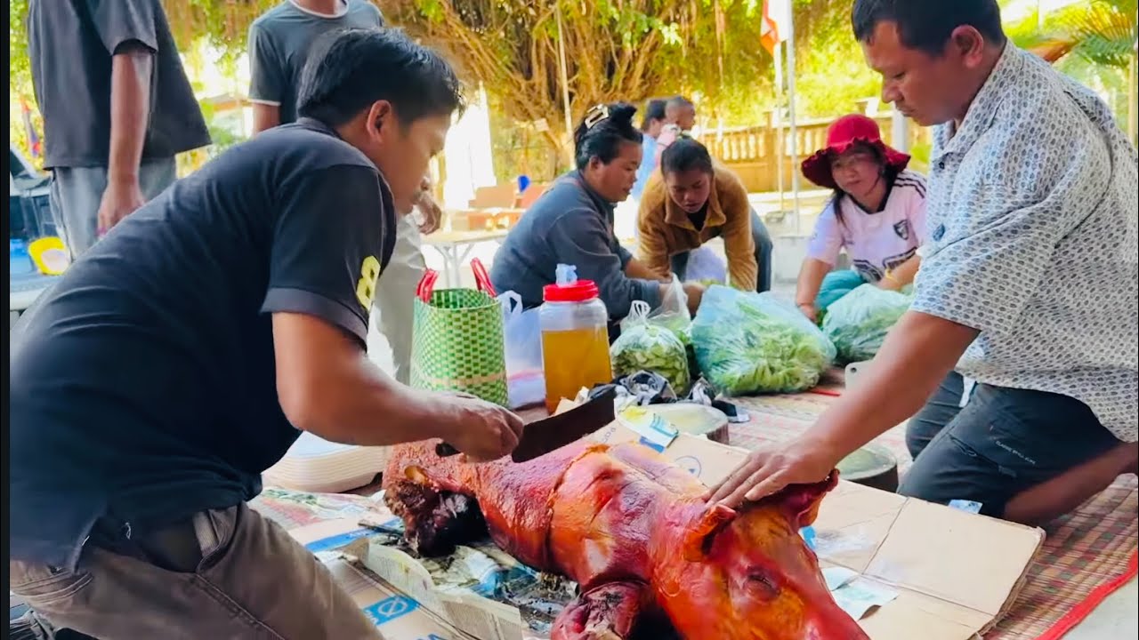 Today, we are serving roasted pork to Cambodian refugees