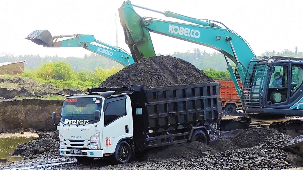 REAL !!! Overloaded Dump Truck Isuzu ELF NMR 71HD By Kobelco SK200 Excavator