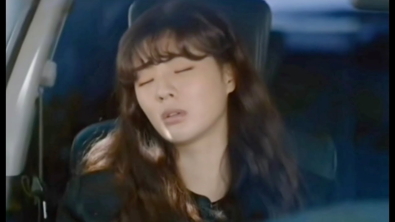 The girls who are sleepy in the passenger seat