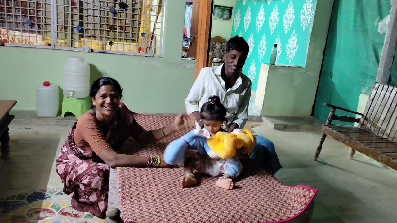 Mahi with  grandpa and grandma 