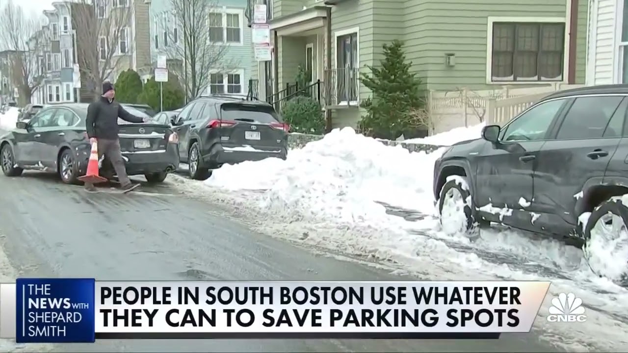 People in South Boston use random items to claim public parking spots after winter storms