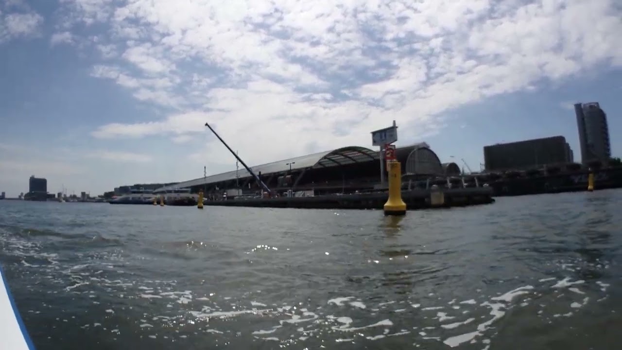Amsterdam Boat trip in IJ River: passing by Central Station-Free Ferry