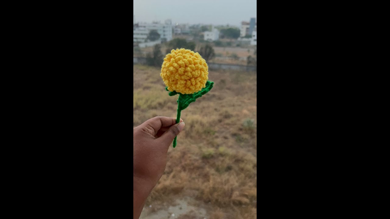 A white ping pong flower crochet ft. Valentine's day