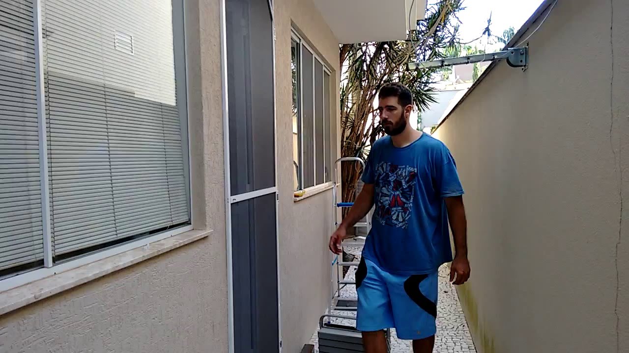 Porta tela mosquiteiro mola vai e vem