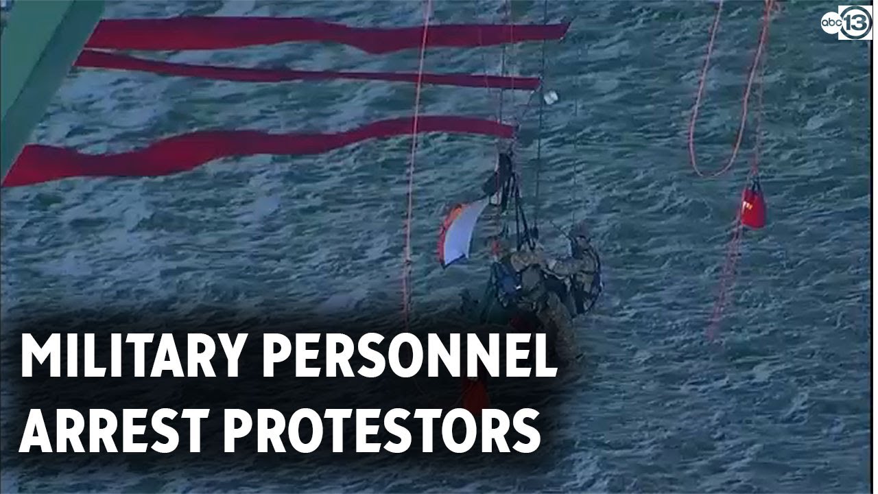 Greenpeace protesters arrested at Fred Hartman Bridge