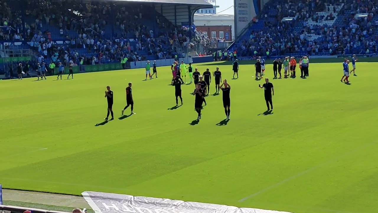 Scenes at the final whistle, showing the Imps superb support away at Portsmouth getting a 0-0 draw.