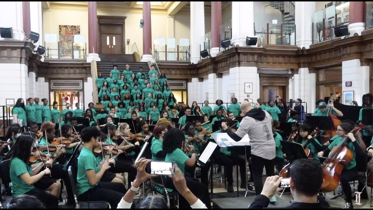 Watch the Philadelphia Orchestra's conductor lead Philly choir students in the Eagles fight song