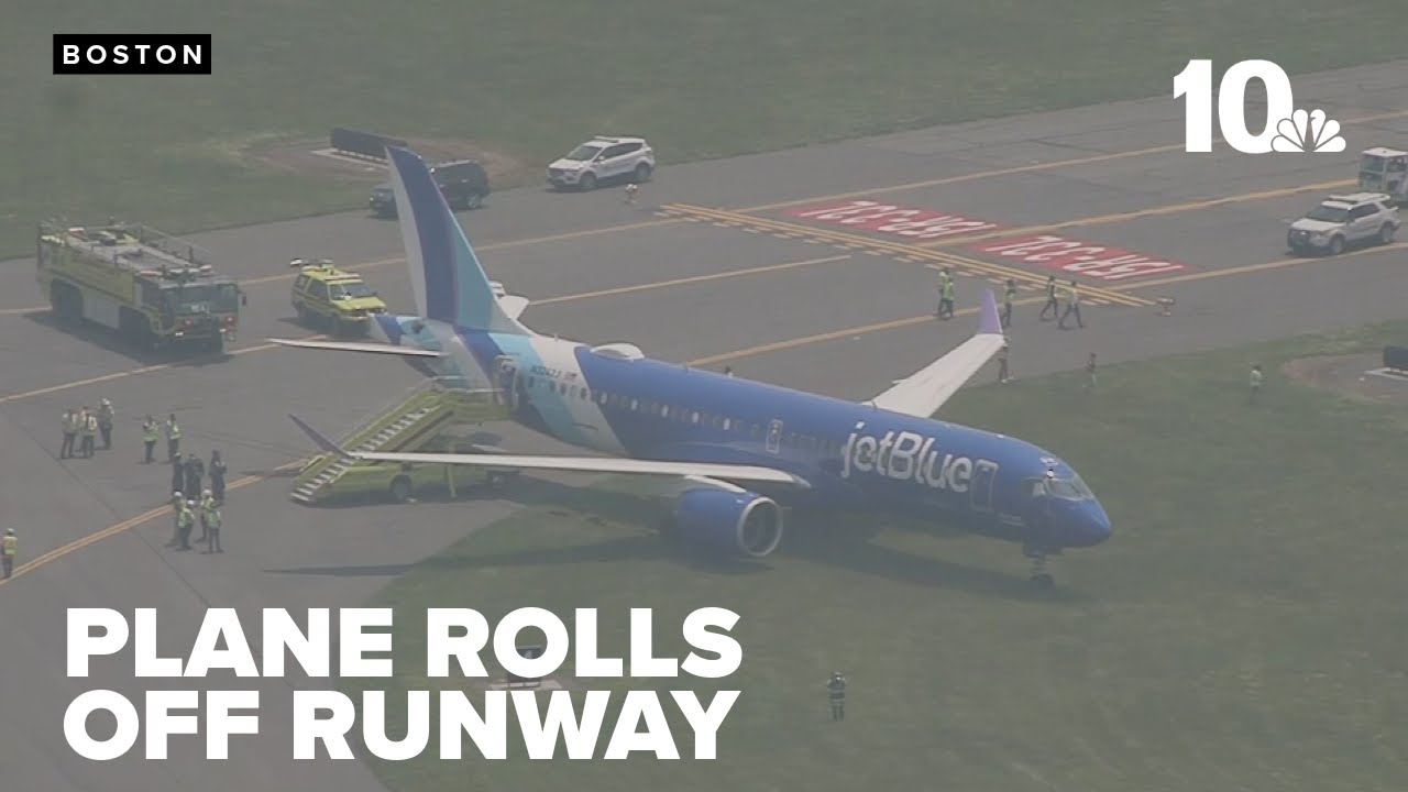 Plane rolls into grass next to runway at Logan International Airport