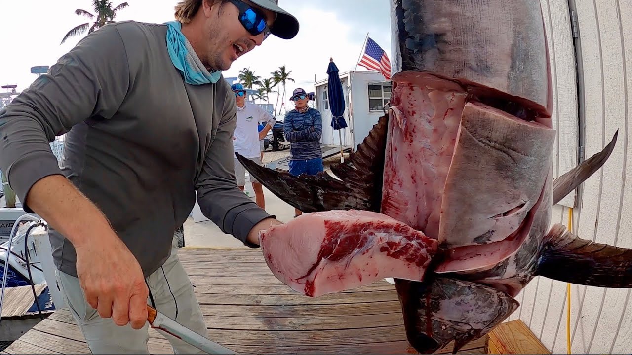FISH CUTTING! Filleting a swordfish and catching mahi