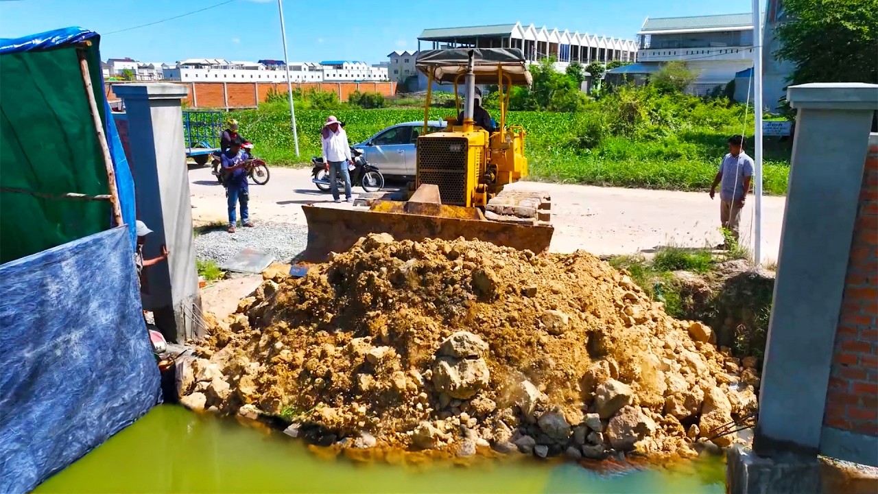 Wonderful New Project! Landfill on Flooded Area Use Dozer D31P Pushing Stone Into Water with Trucks