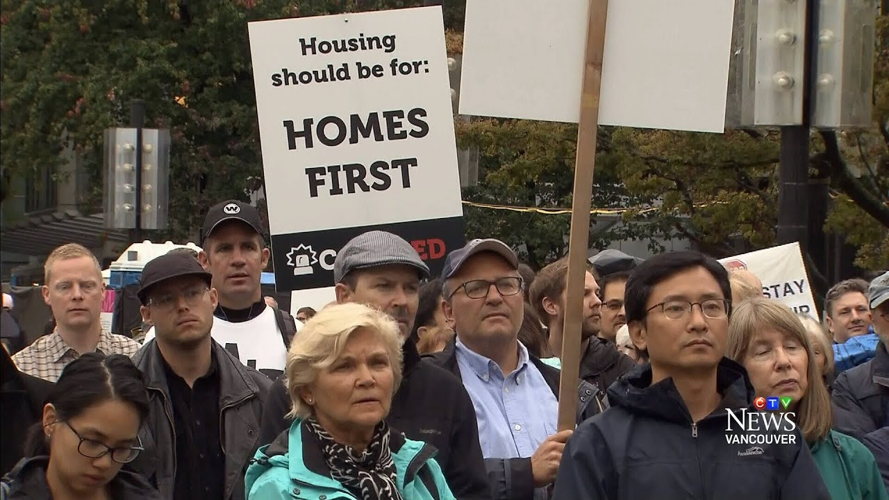 Rally calls for federal crackdown on housing, laundering