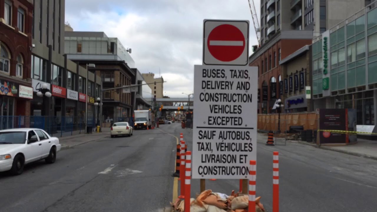 Pouring concrete into the Ottawa sinkhole on Rideau Street
